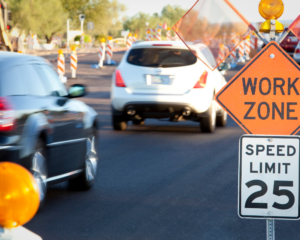 traffic at a road construction work zone because of a car accident