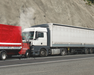 frontal collision of two trucks causing fatal injuries